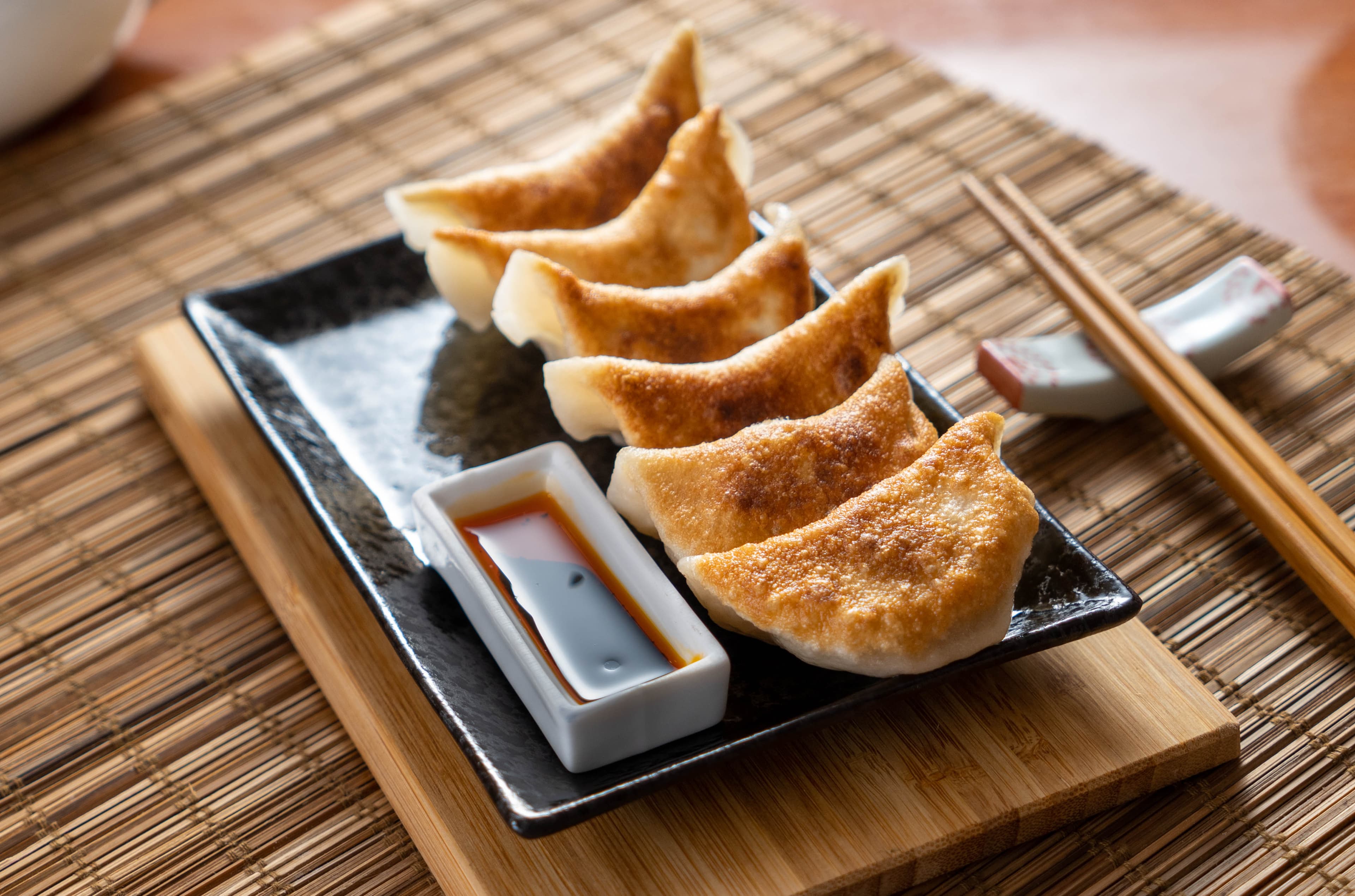 Pork Pot Sticker - Delicious pan-fried dumplings with a savory pork and cabbage filling. Perfect fo | Dim Sum