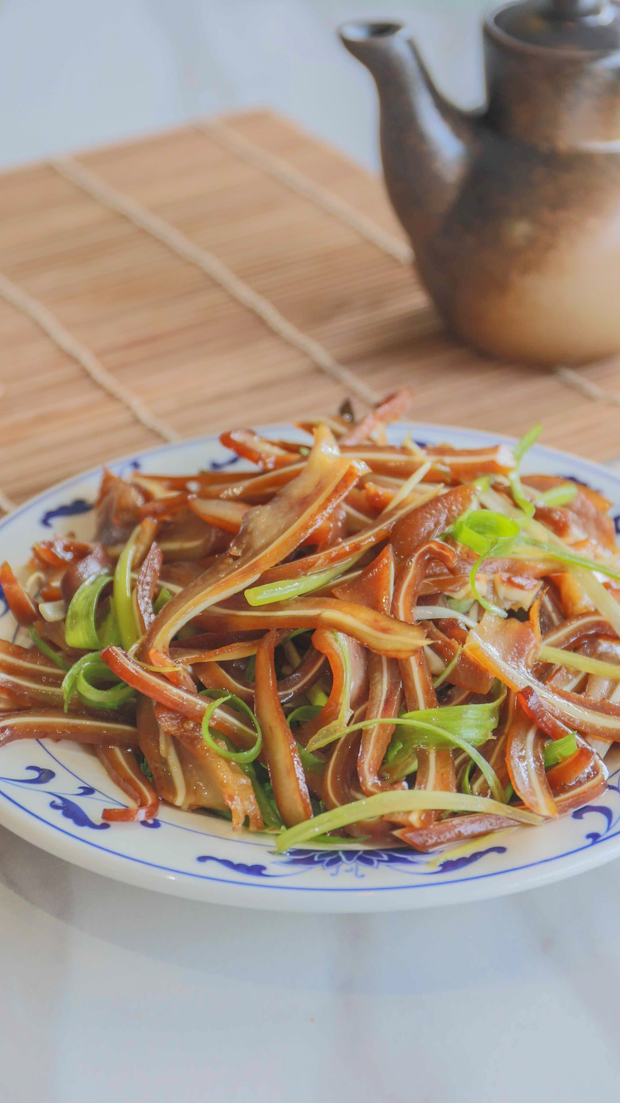 Marinated Pig Ear - Thinly sliced pig ear marinated in a flavorful dressing. A cold appetizer with a | Appetizer