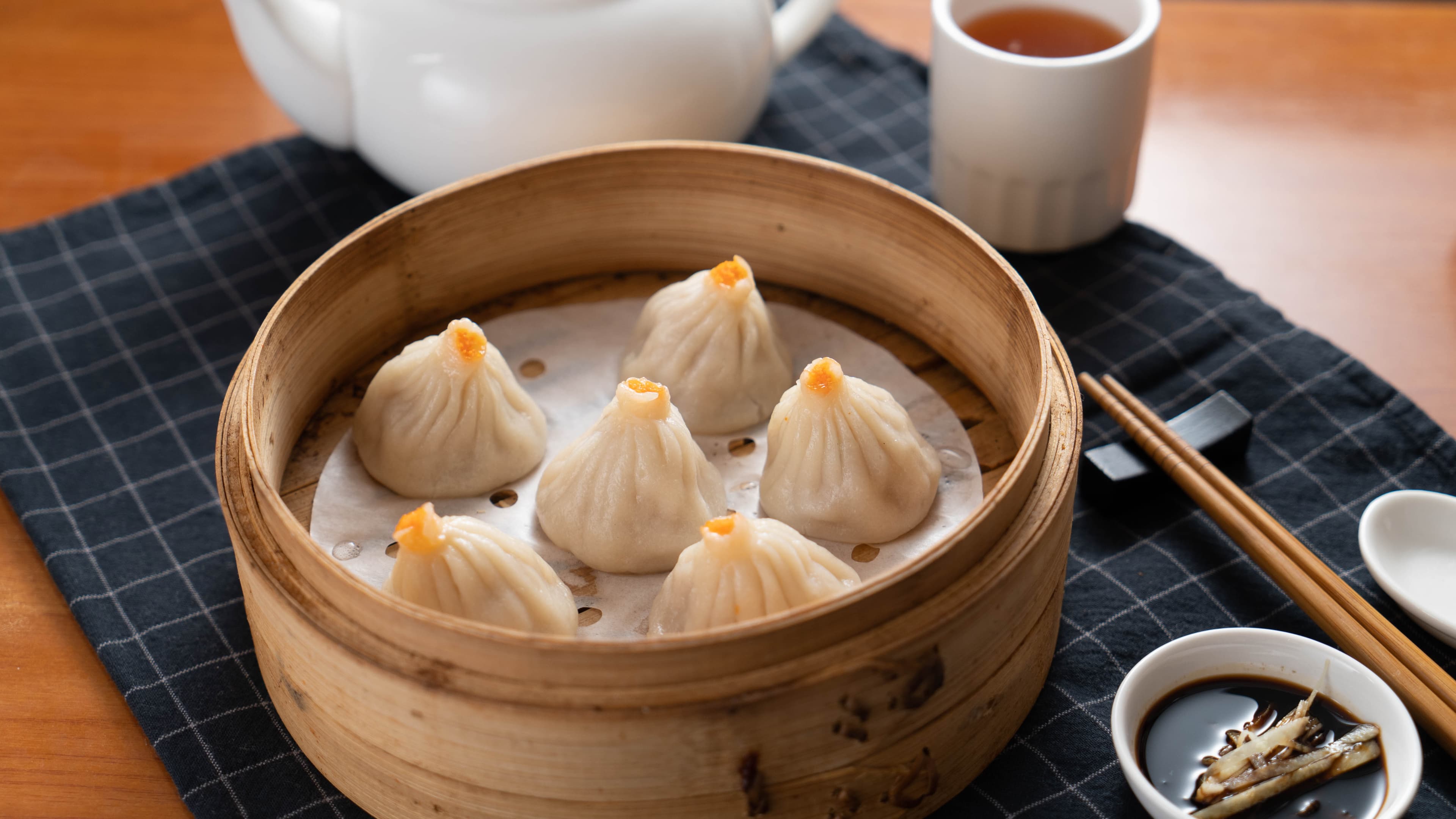 Crab Meat & Pork Soup Dumpling - Exquisite soup dumplings filled with minced crab meat and pork. A delightful var | Dim Sum