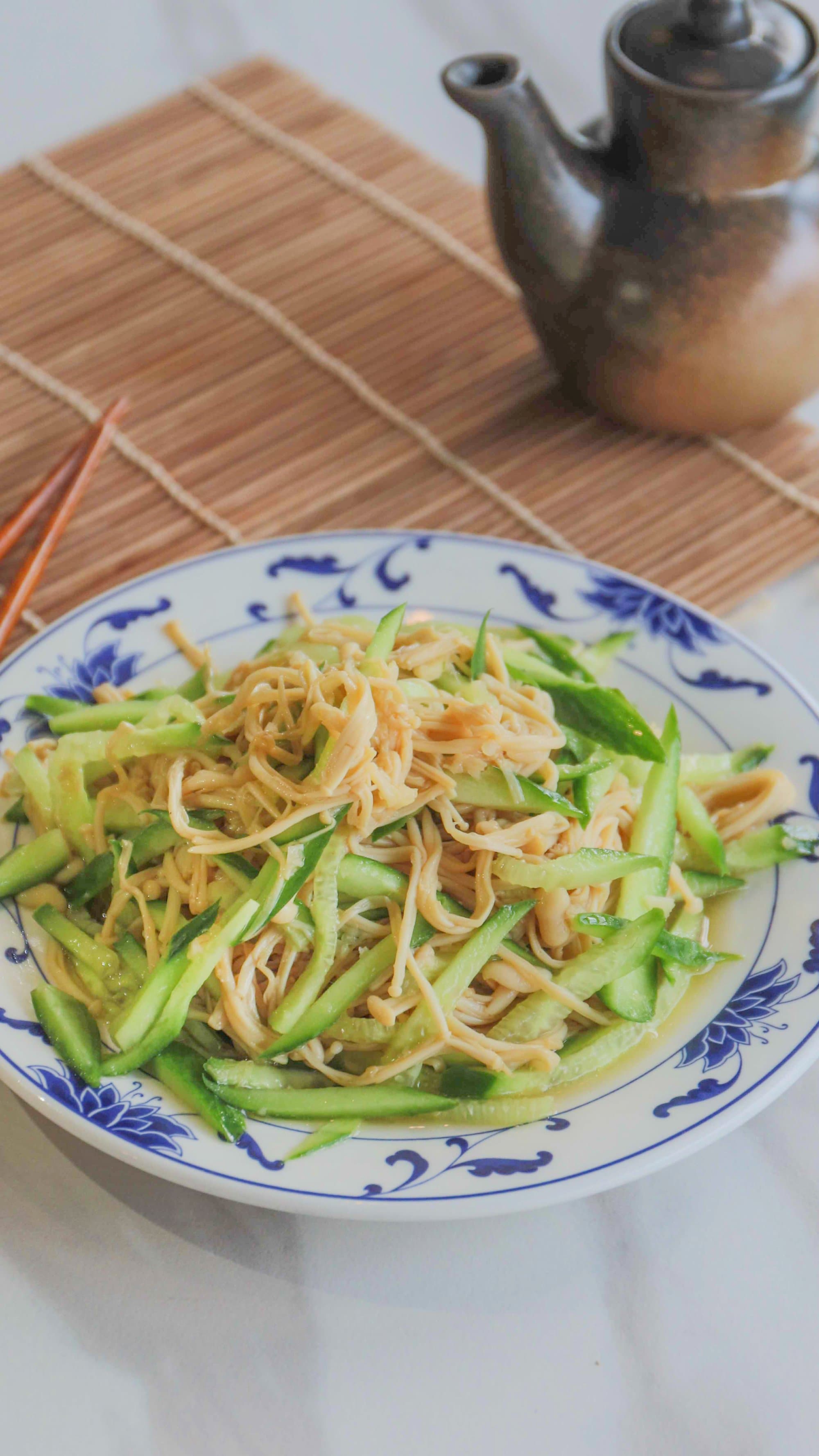 Enoki Mushroom Salad - Enoki mushrooms marinated in a zesty dressing mix sliced fresh cucumber. A light | Appetizer