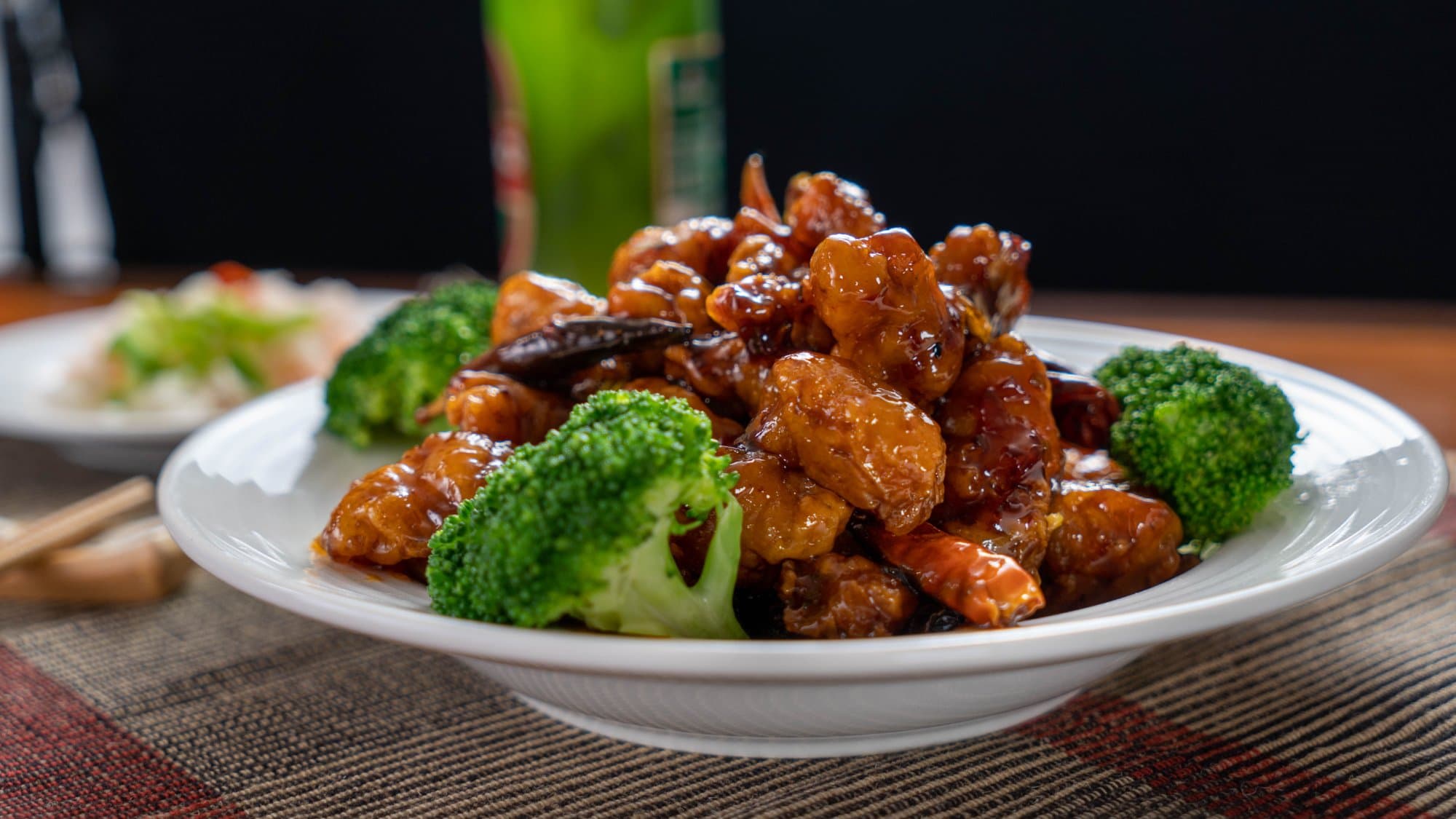 General Tso's Chicken - Crispy battered chicken chunks tossed in a sticky, sweet, and tangy sauce with a | Meat