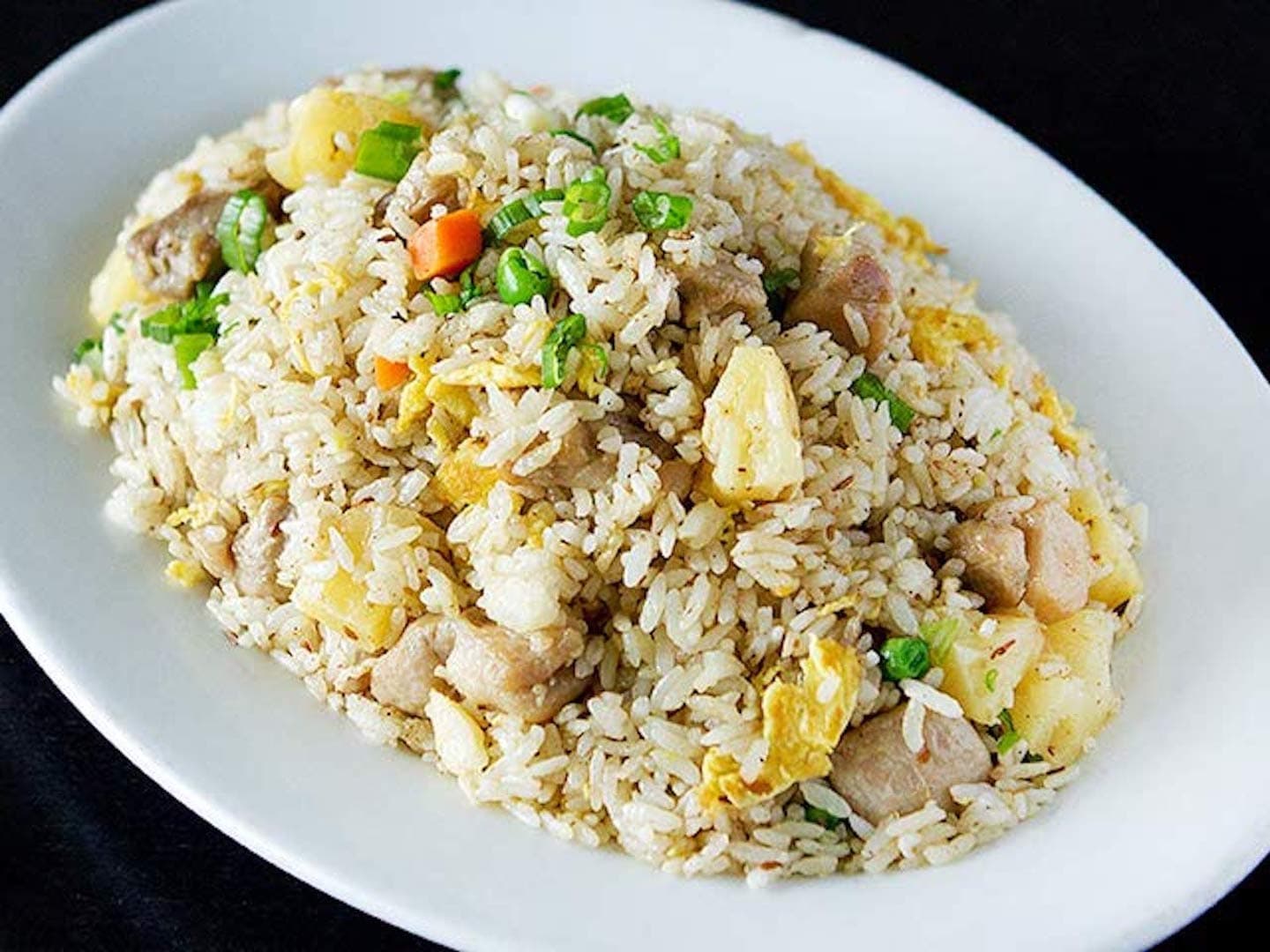 Pineapple Chicken Fried Rice with Cumin - A unique twist on fried rice, this dish features flavorful cumin-spiced chicken | Rice