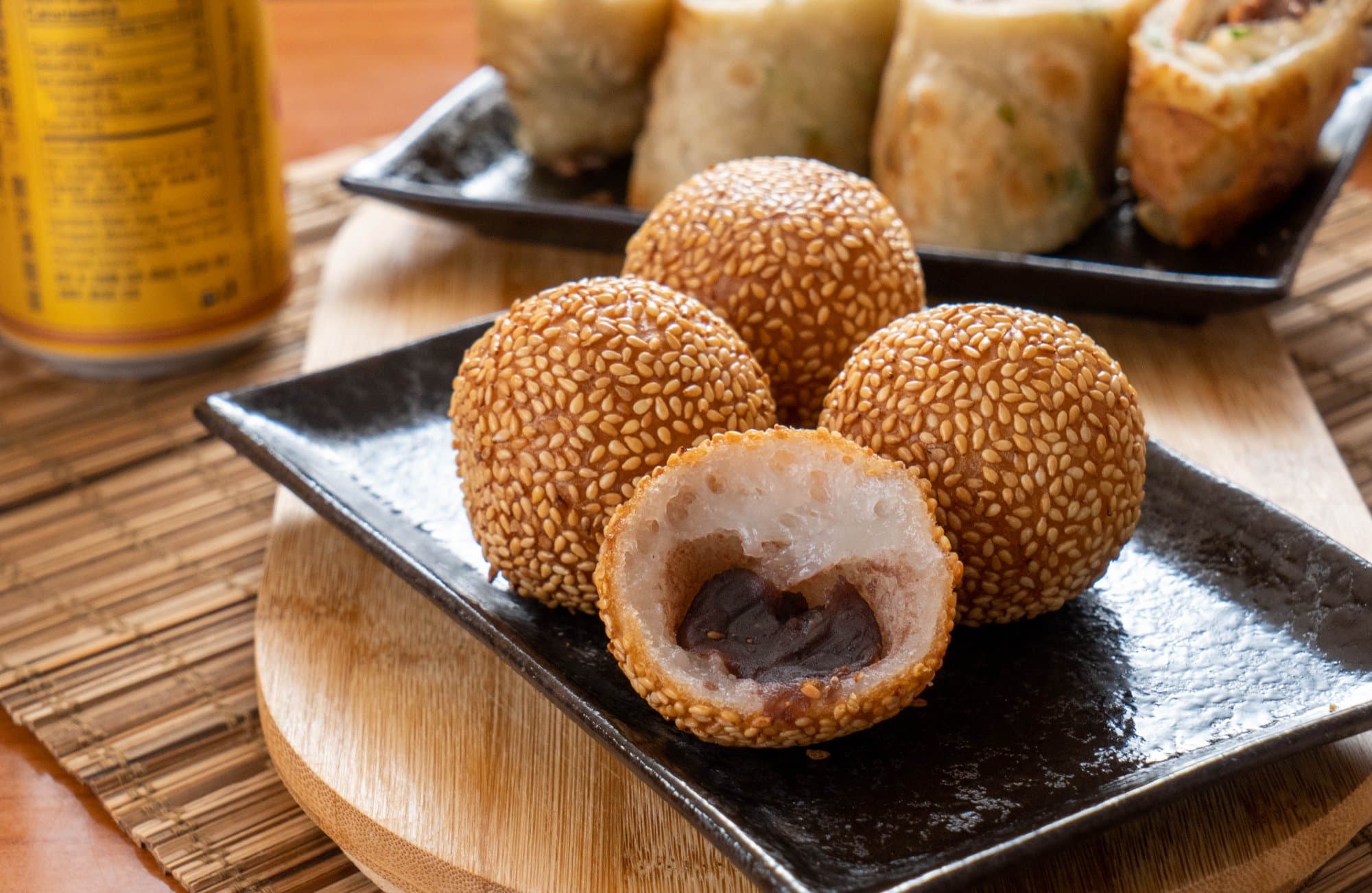 Golden Sesame Ball - A crispy, golden sesame-coated shell surrounds a sweet and velvety red bean fill | Dessert