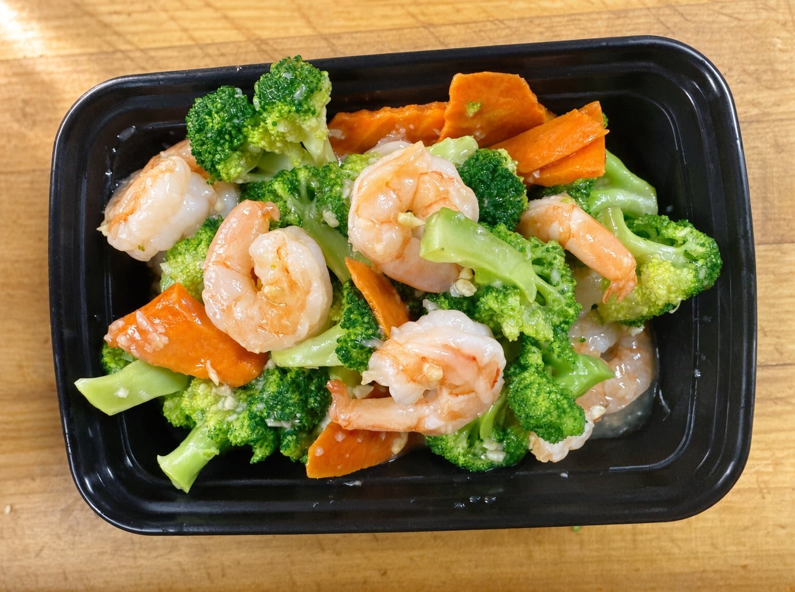 Broccoli Shrimp - Tender shrimp stir-fried with vibrant broccoli florets in a savory sauce. The co | Seafood